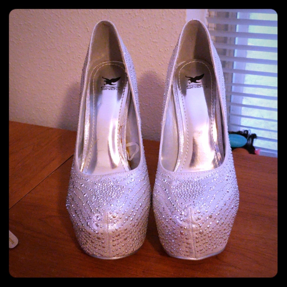 Silver jeweled high heels
